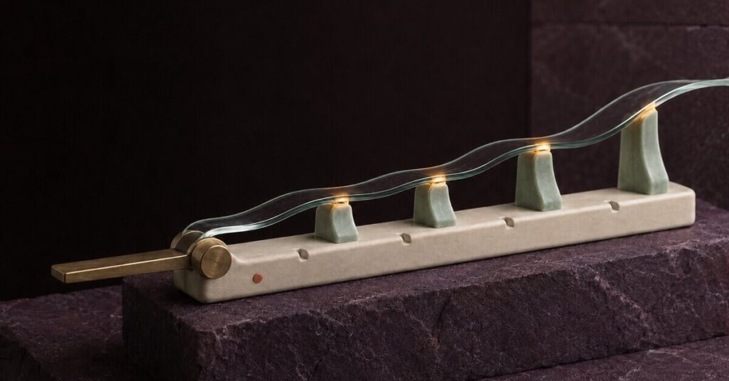 A precision lever raises adjustable cradles beneath a delicate translucent ribbon, symbolizing technology that adds only the support an older adult needs.