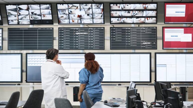 Hospital CEO and team overseeing operational strategy and real-time data